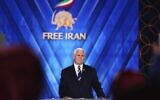 Former US vice president Mike Pence pauses during his speech at the Iranian opposition headquarters in Albania, June 23, 2022. (AP/Franc Zhurda)