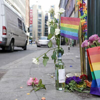Flowers are left at the scene of a shooting in central Oslo, June 25, 2022. (Hakon Mosvold Larsen/NTB Scanpix via AP)