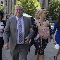 Lev Parnas, a former associate of Rudy Giuliani, arrives at the federal courthouse with his wife Svetlana Parnas in New York, June 29, 2022. (AP Photo/Yuki Iwamura)