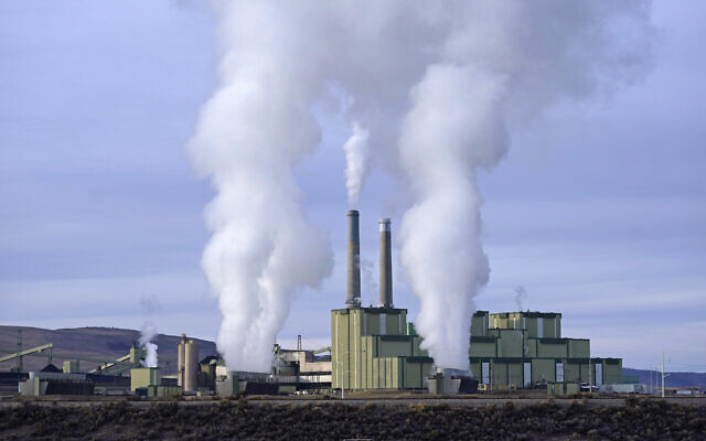 Steam billows from a coal-fired power plant November 18, 2021, in Craig, Colorado. (AP Photo/Rick Bowmer, File)