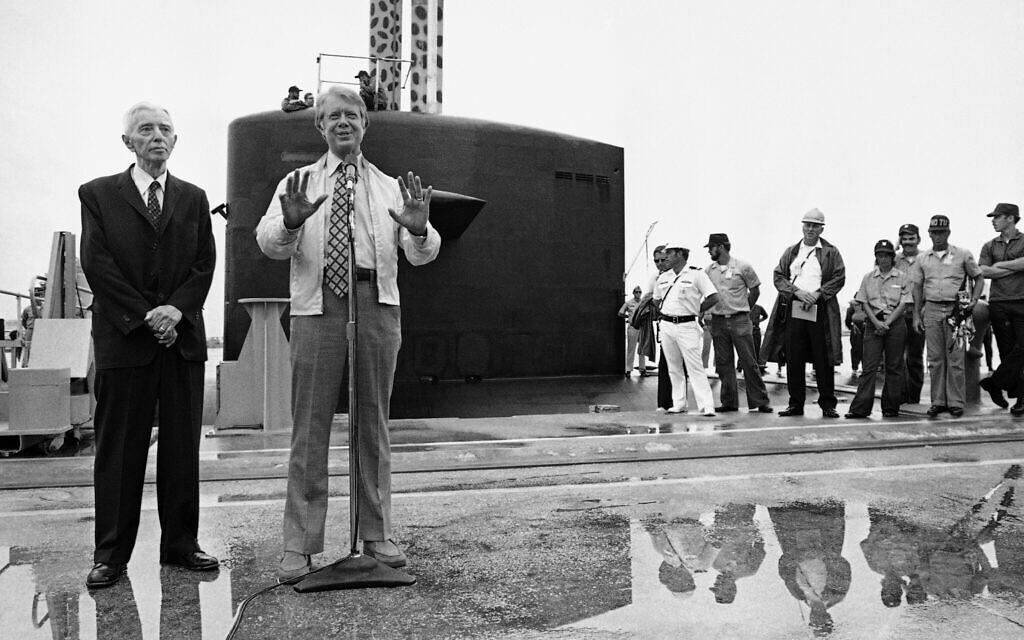 Admiral Hyman Rickover, left, stands by as then-US president Jimmy Carter tells newsmen of his submarine ride aboard the nuclear submarine USS Los Angeles, May 28, 1977. (AP Photo)