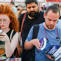 Israelis attend the annual Hebrew Book Week, Rabin Square, Tel Aviv on June 12, 2019. (Flash90)
