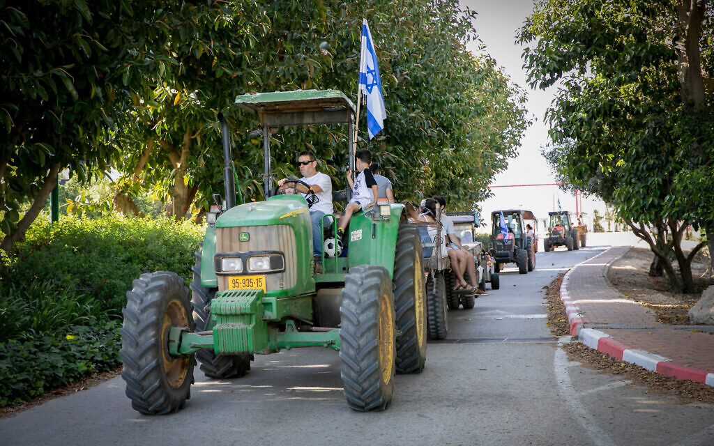 Israelis seen at a celebration for the Jewish holiday of Shavuot in Kibbutz Sarid, in Emek Yizrael on May 16, 2021. (Anat Hermony/Flash90)