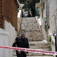 Police at the scene where a man  murdered his wife and then tried to kill himself on June 12, 2022, in Haifa (Shir Torem/Flash90)