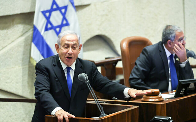 Opposition leader Benjamin Netanyahu adresses the Knesset on June 13, 2022. (Yonatan Sindel/Flash90)