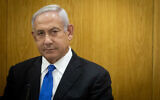 Opposition leader Benjamin Netanyahu heads a Likud faction meeting at the Knesset on June 20, 2022. (Yonatan Sindel/Flash90)