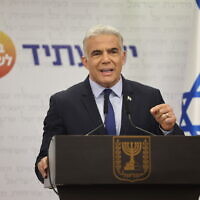 Foreign Minister Yair Lapid speaks during a Yesh Atid faction meeting at the Knesset in Jerusalem, June 20, 2022. (Yonatan Sindel/Flash90)