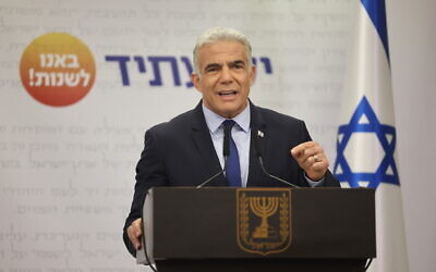 Foreign Minister Yair Lapid speaks during a Yesh Atid faction meeting at the Knesset in Jerusalem, June 20, 2022. (Yonatan Sindel/Flash90)