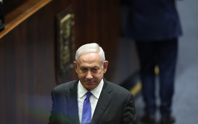 Opposition leader Benjamin Netanyahu at the Knesset plenum in Jerusalem, June 20, 2022. (Yonatan Sindel/Flash90)