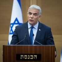 Foreign Minister Yair Lapid and Prime Minister Naftali Bennett (not pictured) hold a joint press conference at the Knesset on June 20, 2022. (Yonatan Sindel/Flash90)