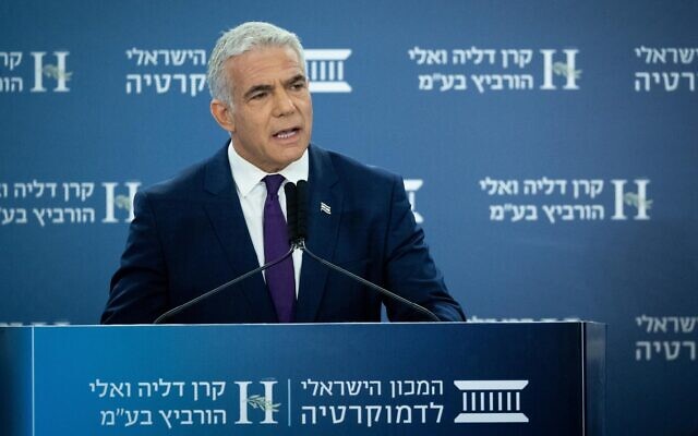 Foreign Minister Yair Lapid speaks at a conference organized by the Israel Democracy Institute in Jerusalem on June 21, 2022. (Yonatan Sindel/Flash90)