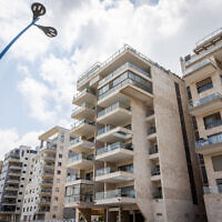 A view of apartment buildings in the Givat Olga neighborhood in Hadera, on June 22, 2022. (Nati Shohat/Flash90)