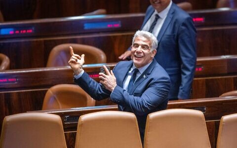 Foreign Minister Yair Lapid during a discussion and vote for the first reading of the bill to dissolve the Knesset, June 27, 2022. (Olivier Fitoussi/Flash90)