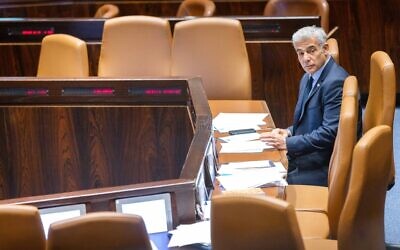 Minister of Foreign Affairs Yair Lapid during a discussion and a vote on a bill to dissolve the Knesset, on June 27, 2022. (Olivier Fitoussi/Flash90)