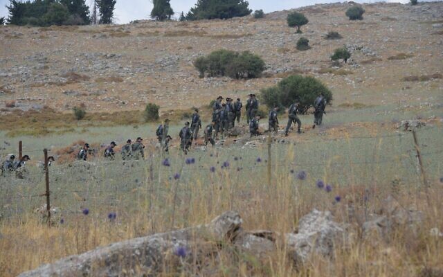 Police officers search for a missing teen in the Mount Meron area, June 22, 2022. (Israel Police)