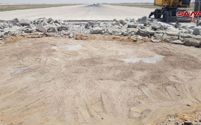 Repair works are seen at Syria's Damascus International Airport, after an airstrike attributed to Israel, June 12, 2022. (SANA)