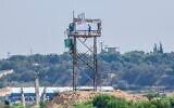 Hamas members are seen in an observation post in Gaza, overlooking an Israeli border community. The site was struck by the Israel Defense Forces hours earlier on June 18, 2022 in response to rocket fire. (Amnon Ziv/Courtesy)