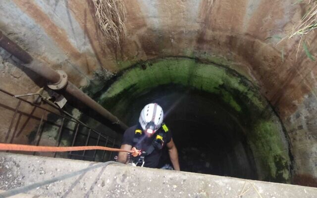 Rescue services inside the well where a father and his daughter were trapped, June 18, 2022. (Israel Fire and Rescue Services)
