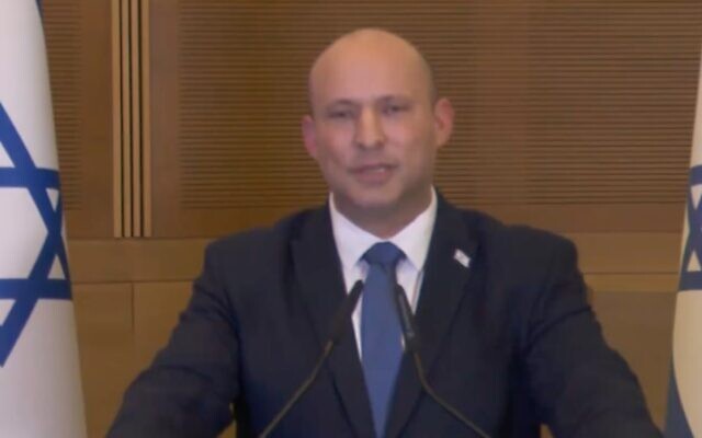 Prime Minister Naftali Bennett addresses the public on June 29, 2022, announcing he will not compete in the coming elections. (Screen capture/Channel 12)