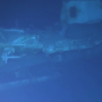 An image taken from a video of the USS Samuel B. Roberts shipwreck found on a slope at a depth of 6,985 meters on June 22, 2022. (Screenshot: Twitter)