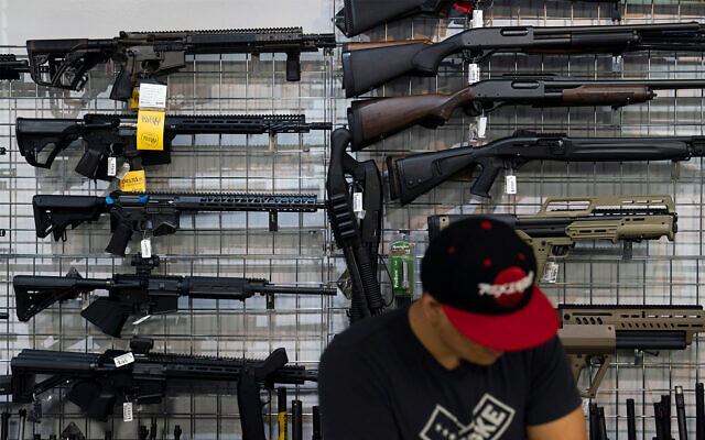Guns on display at Burbank Ammo & Guns in Burbank, California, June 23, 2022. (AP Photo/Jae C. Hong)