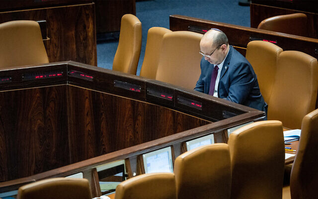 Prime Minister Naftali Bennett during a discussion and a vote on the minimum wage at the Knesset in Jerusalem on June 8, 2022. (Yonatan Sindel/Flash90)