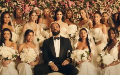 Drake poses for a photo with his many brides. (YouTube screenshot via JTA)