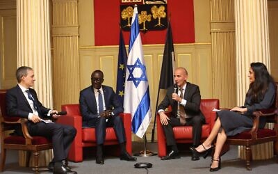 Simon Seroussi, spokesman for Israel's embassy in France (L), Magatte Seye, Senegal's envoy to France, Ben Bourgel, Israel's envoy to Senegal, and Anne-Sophie Sebban-Bécache, director of AJC Paris, speak at the Israel Back to Africa summit in Paris, May 31, 2022. (MFA)