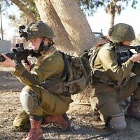 Illustrative: Female soldiers during training, in an undated photography published by the military on Jun 7, 2022. (Israel Defense Forces)
