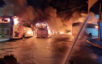 Burning buses at Safed central bus station, June 11, 2022. (Israel Fire and Rescue Services)