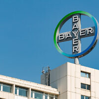 German pharmaceutical giant Bayer's logo at the company's Berlin headquarters, May 2016. (brunocoelhopt via iStock by Getty Images)
