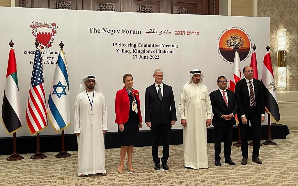 Senior diplomats from Israel, the US, and regional Arab allies pose for pictures at their Negev Summit follow-up meeting in Bahrain, June 27, 2022 (Foreign Ministry)