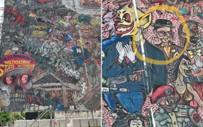 Part of a mural by Indonesian art group Taring Padi on display at the Documenta 15 art festival. On the right, a man is depicted with sidelocks often associated with Orthodox Jews, fangs and bloodshot eyes, and is wearing a black hat with the SS-insignia. (Screen capture/Twitter)