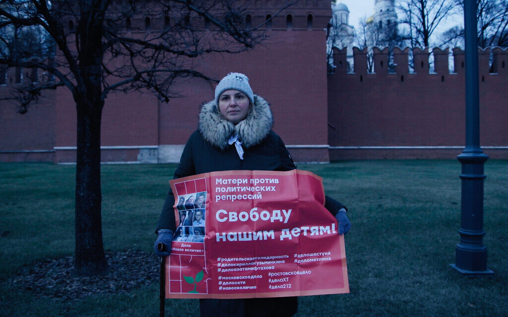 Anna (Anya) Pavlikova's mother Julia protests, calling for the freedom of her daughter, who is being held as a political prisoner. (IV Films/The New Greatness Case