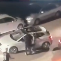 Video footage released on June 9 shows a number of Palestinians from the Issawiya neighborhood in East Jerusalem assaulting an off-duty police officer in the French Hill neighborhood in Jerusalem. (Twitter/Channel 13)