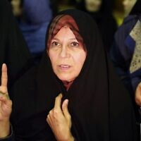 In this file photo from February 18, 2016, Faezeh Hashemi, daughter of Iran's former president Akbar Hashemi-Rafsanjani, attends a campaign meeting for the reformists for the upcoming parliamentary elections at the Hejab hall in the capital Tehran. (Atta Kenare/AFP)