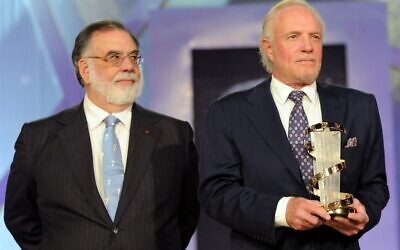 In this file photo taken on December 5, 2010, director Francis Ford Coppola (L) presents an award to actor James Caan during a tribute to the latter's career at the 10th Marrakesh International Film Festival in Marrakesh. (Abdelhak Senna/AFP)
