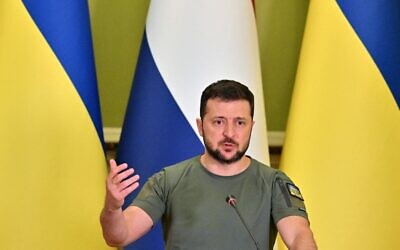 Ukrainian President Volodymyr Zelensky gestures while addressing a press conference with Netherland's Prime Minister, following talks in Kyiv on July 11, 2022. (Sergei Supinsky/AFP)