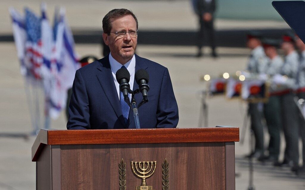 Israeli President Isaac Herzog delivers a statement following the arrival of US President Joer Biden at Ben Gurion Airport, on July 13, 2022. (JACK GUEZ / AFP)