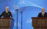 US President Joe Biden, left, and Prime Minister Yair Lapid give a joint press conference in Jerusalem, on July 14, 2022. (Atef Safadi /AFP)