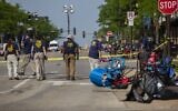 FBI agents work the scene of a shooting at a Fourth of July parade on July 5, 2022 in Highland Park, Illinois. ( Jim Vondruska/Getty Images/AFP)