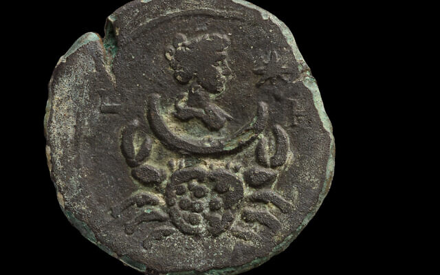 An 1,850-year-old coin bearing the image of Luna, the goddess of the moon. found off the Carmel Coast. (Dafna Gazit, Israel Antiquities Authority)