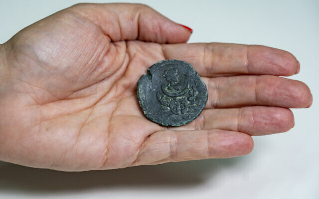 A 1,850-year-old coin bearing the image of Luna, the goddess of the moon found off the Carmel Coast.. (Yaniv Berman, Israel Antiquities Authority)