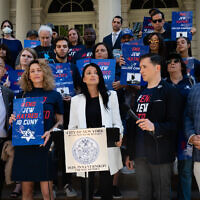 New York City Council Member Inna Vernikov, center, and activists against antisemitism at New York City Hall on June 30, 2022. (Luke Tress/Times of Israel)
