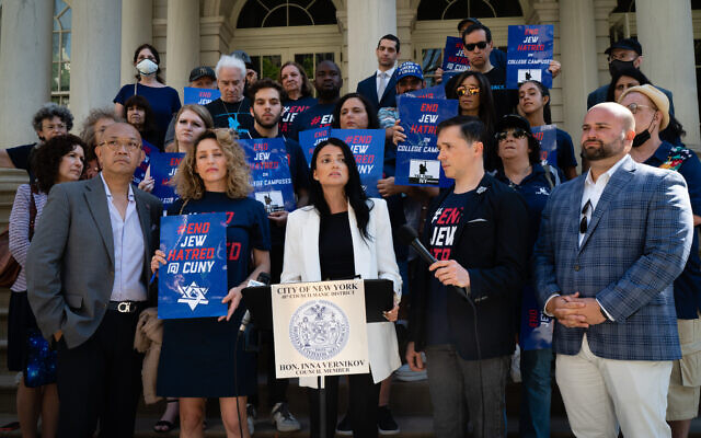 New York City Council Member Inna Vernikov, center, and activists against antisemitism at New York City Hall on June 30, 2022. (Luke Tress/Times of Israel)