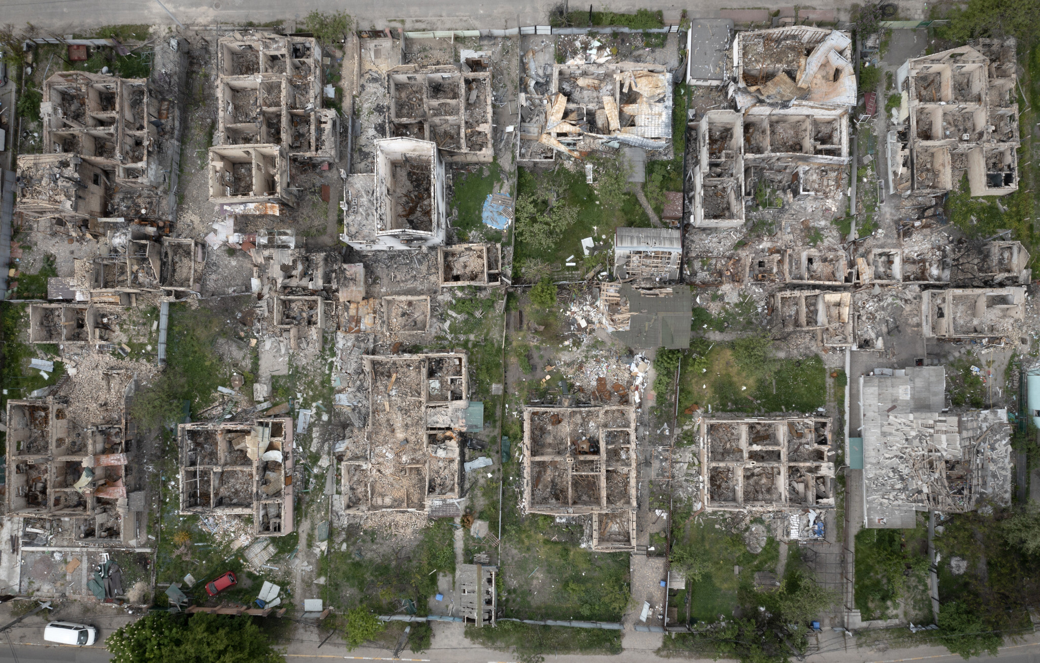 An aerial view of a residential area ruined by the Russian shelling in Irpin close to Kyiv, Ukraine, Saturday, May 21, 2022. (AP Photo/Efrem Lukatsky)