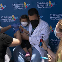 Three-year-old Sofia Espinoza receives the Pfizer COVID-19 vaccine at Children's Hospital Los Angeles in Los Angeles, California, June 21, 2022. (AP Photo/Jae C. Hong)