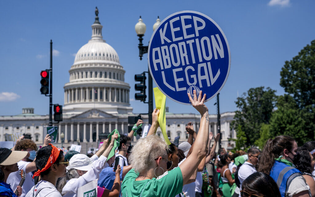 Abortion-rights activists demonstrate against the US Supreme Court decision to overturn Roe v. Wade that established a constitutional right to abortion, on Capitol Hill in Washington, June 30, 2022. (AP Photo/J. Scott Applewhite)