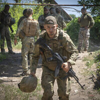 Ukrainian soldiers attend their positions, in the Donetsk region, Ukraine, July 2, 2022. (Efrem Lukatsky/AP)