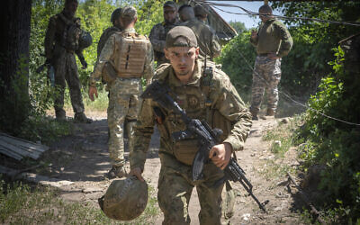 Ukrainian soldiers attend their positions, in the Donetsk region, Ukraine, July 2, 2022. (Efrem Lukatsky/AP)